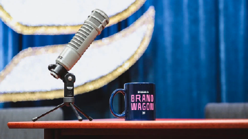 brandwagon branded mug and a microphone